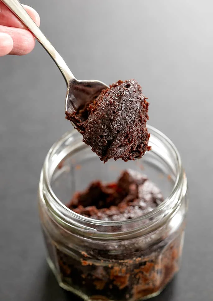 3 Ingredient Chocolate Cake for One serving a spoonful of cake
