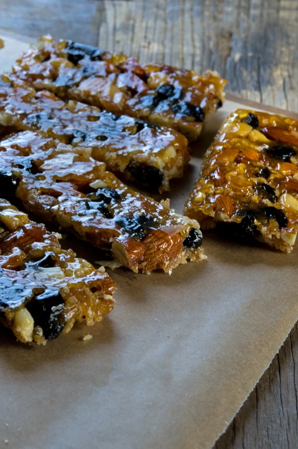 5 granola bars on brown surface 