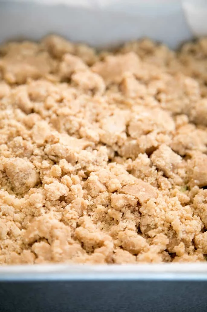 A close of up the crumbles on the top of the cake. 