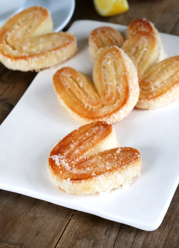 A close up of elephant ears on a white plate