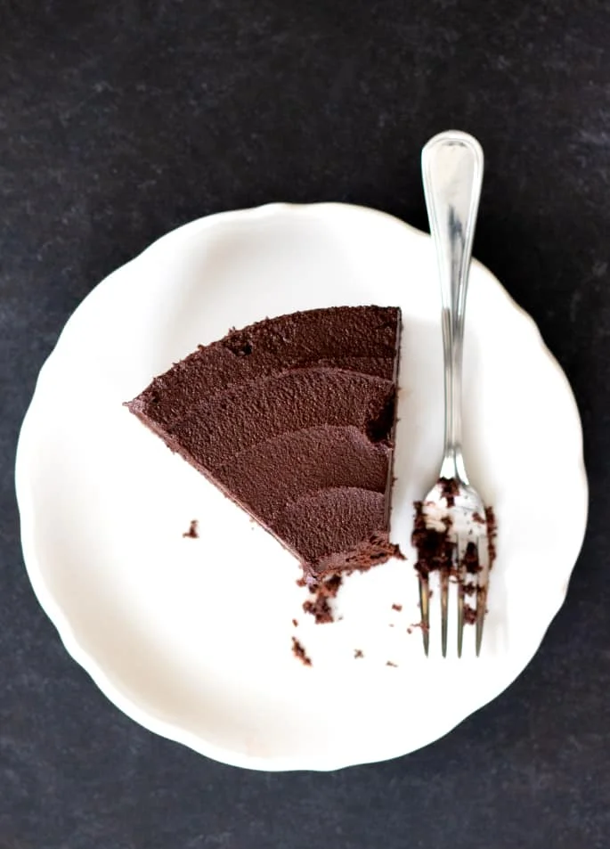 A moist and tender Paleo chocolate cake that's rich in chocolate flavor, but not too sweet. Layer it with a deep chocolate frosting, and let's celebrate!
