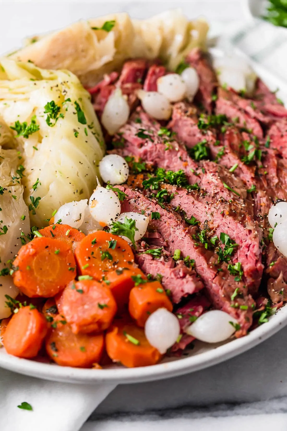A plate of corned beef and cabbage