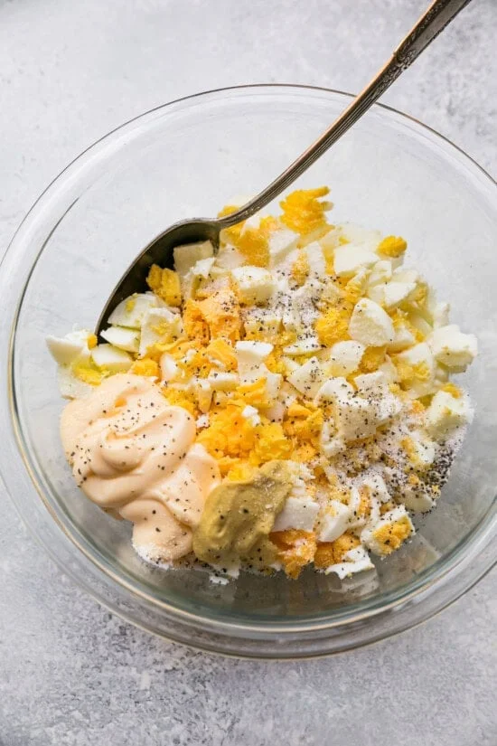 Add to a bowl with mayo, Dijon, salt pepper and pickle juice.