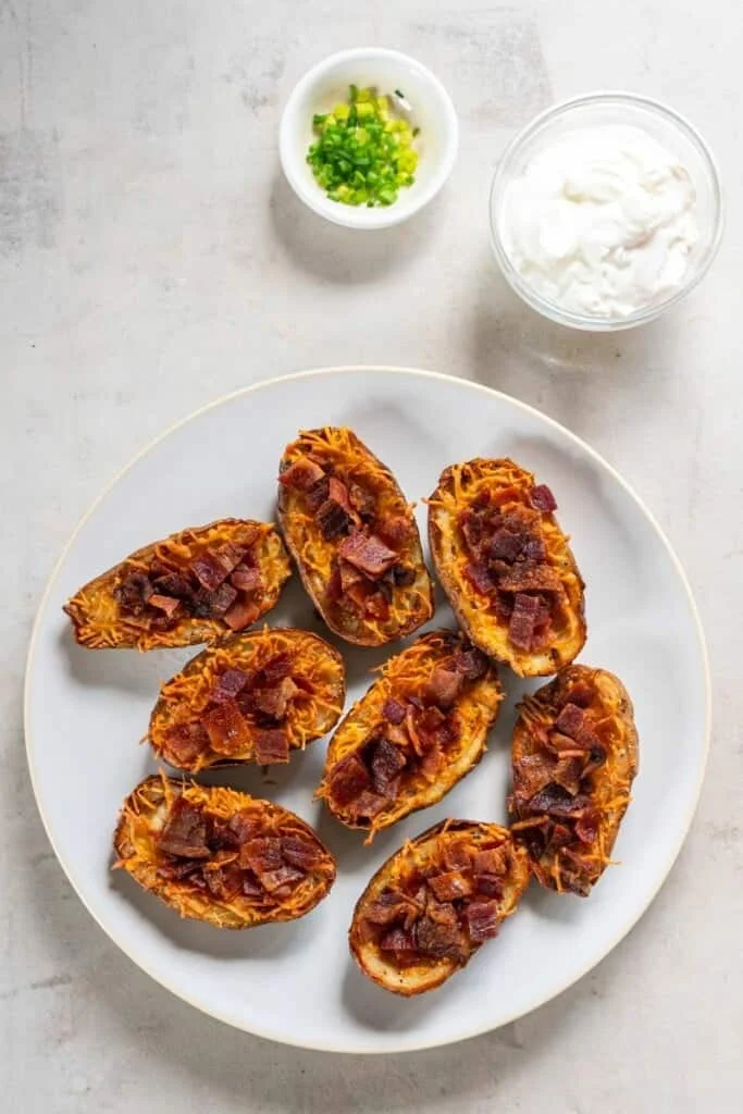 adding crispy baking to air fried potato skins. 