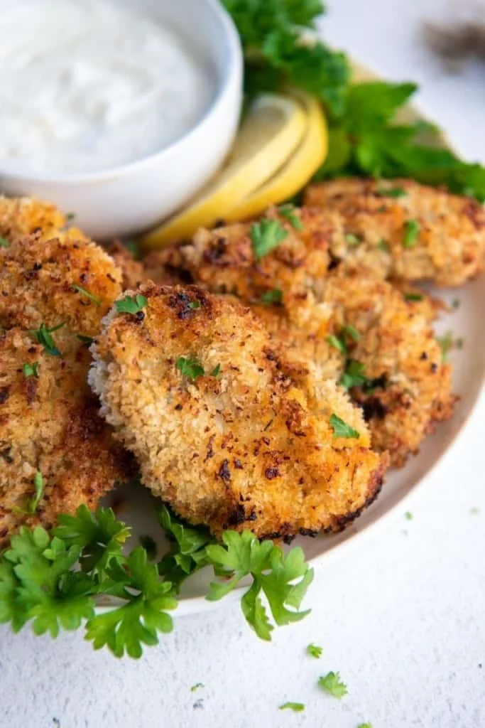 air fryer oysters on plate with dipping sauce