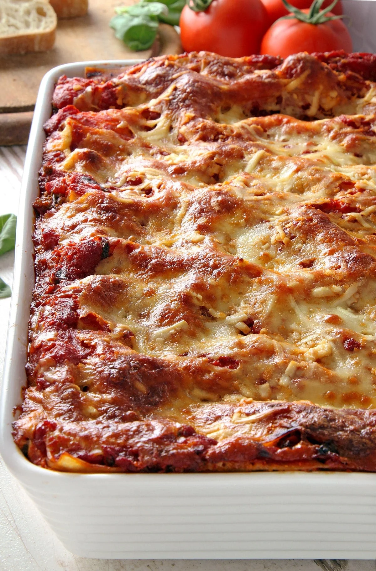 An overhead view of lasagna in a metal pan.