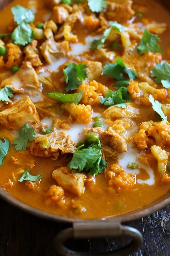 Angled view of Instant Pot chicken tikka masala with caulfilower