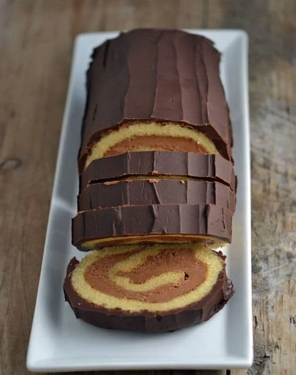 Bûche de Noël cake on white plate