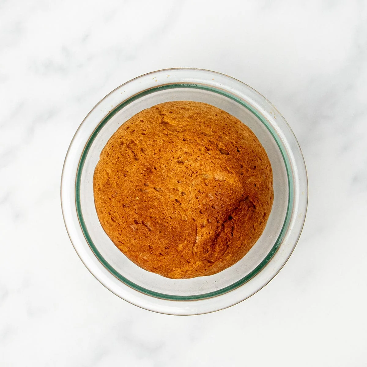 baked browned bottom of artisan bread in same bowl
