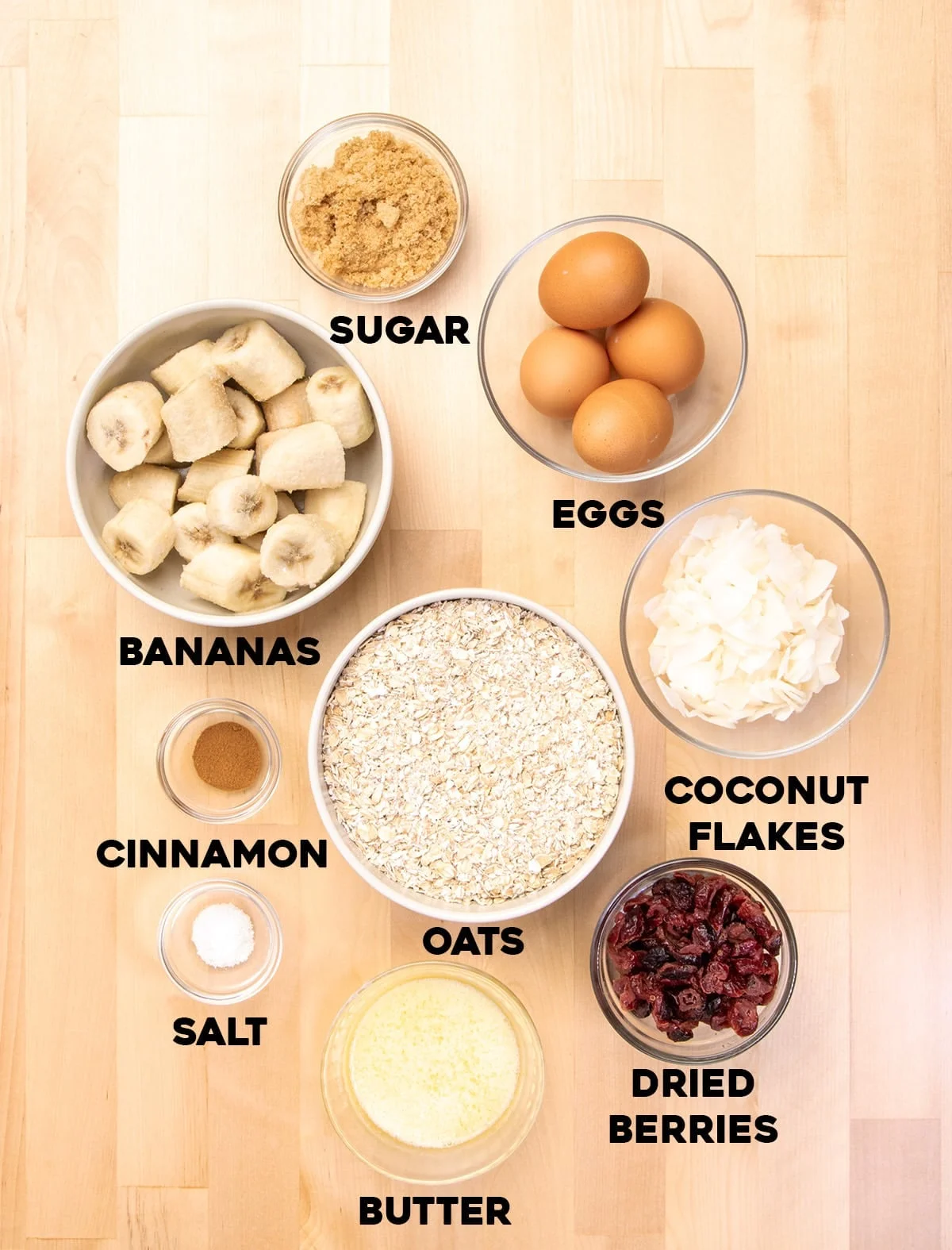 baked oatmeal cups ingredients in small bowls