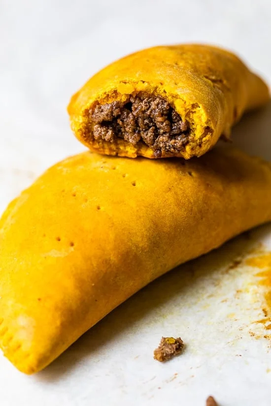 beef patties with a bite taken out