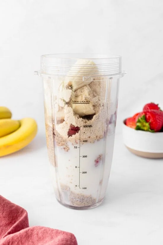 blender with protein powder and milk