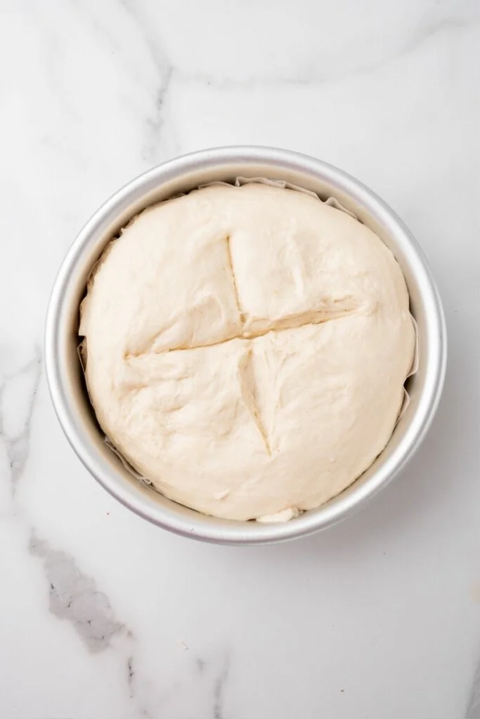 Bread dough in baking pan ready to be baked.
