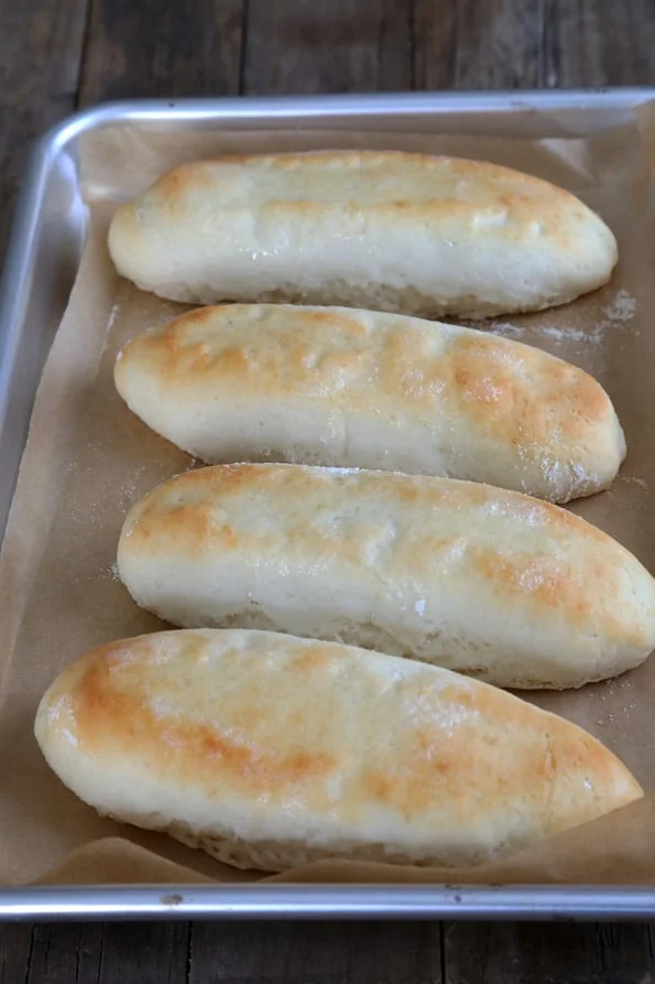 Breadsticks on brown surface. 