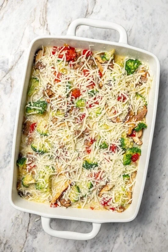Breakfast casserole in baking dish before baking.