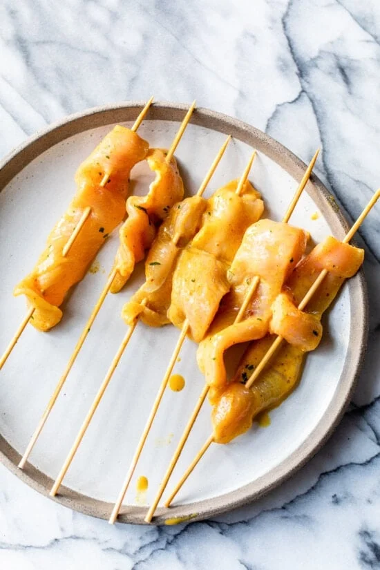chicken on wooden skewers