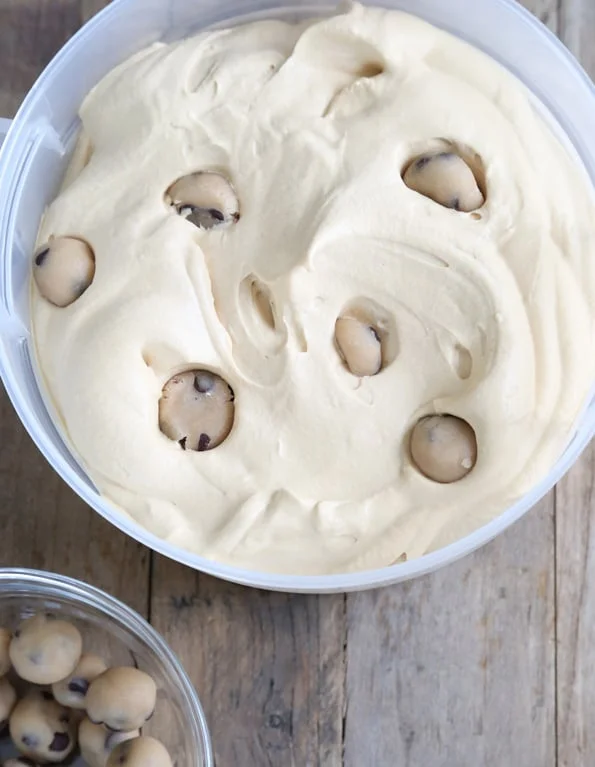 Chocolate Chip Cookie Dough Ice Cream in a large white tub.