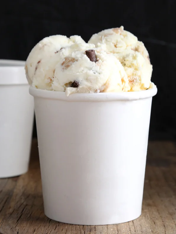 Chocolate Chip Cookie Dough Ice Cream in white jar.