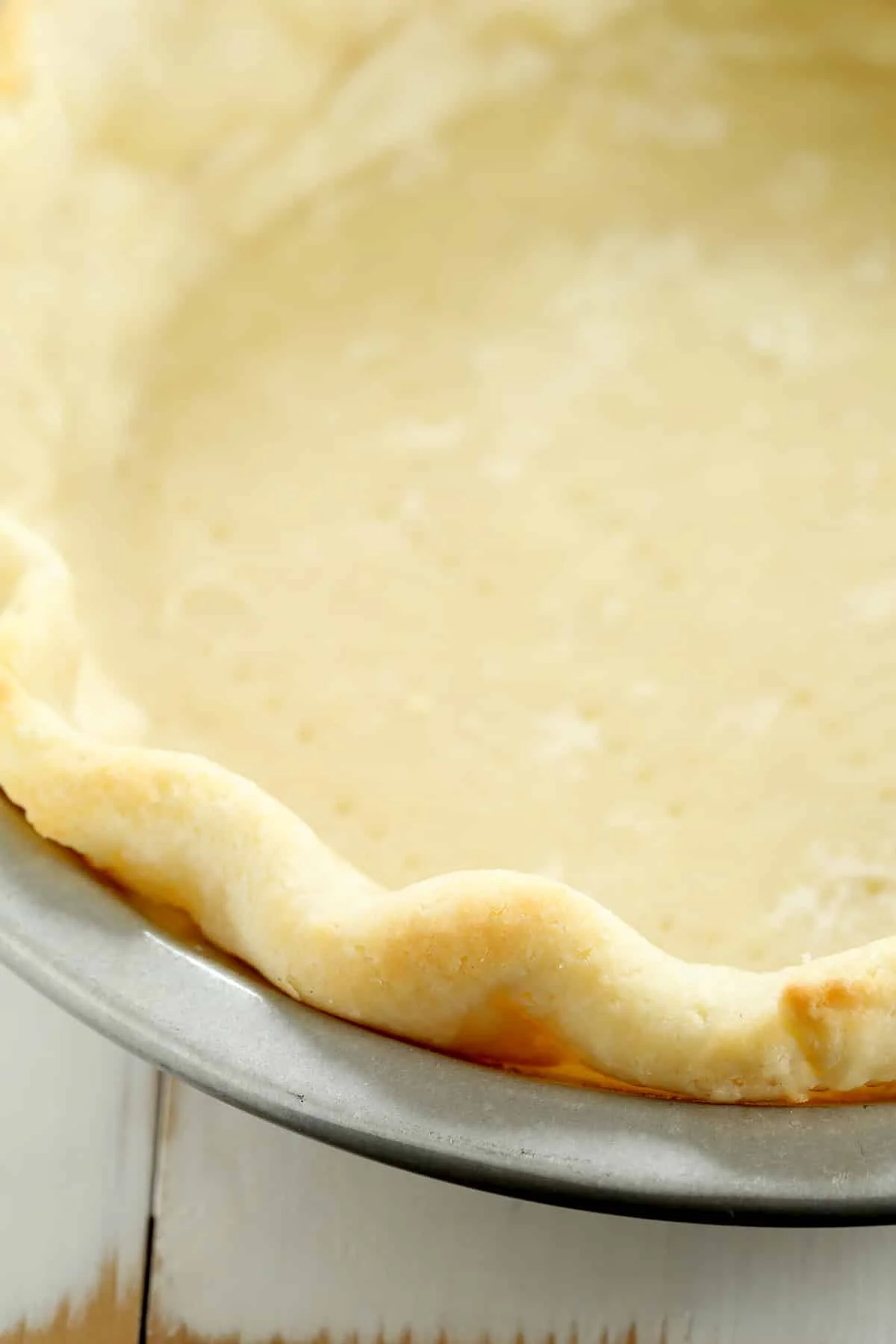 Close up view of the edge of the pie crust. 