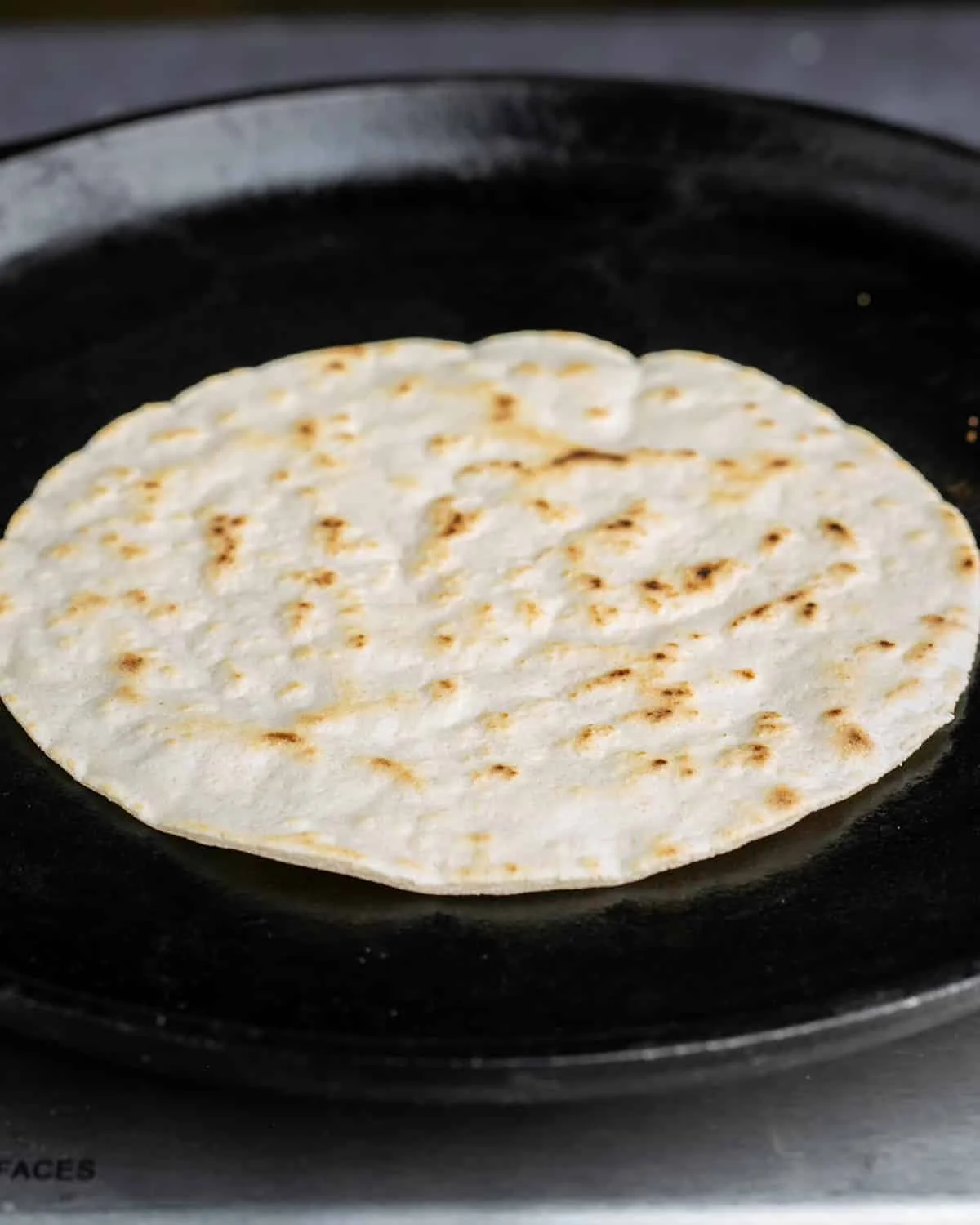 Cooked cassava flour tortilla in skillet