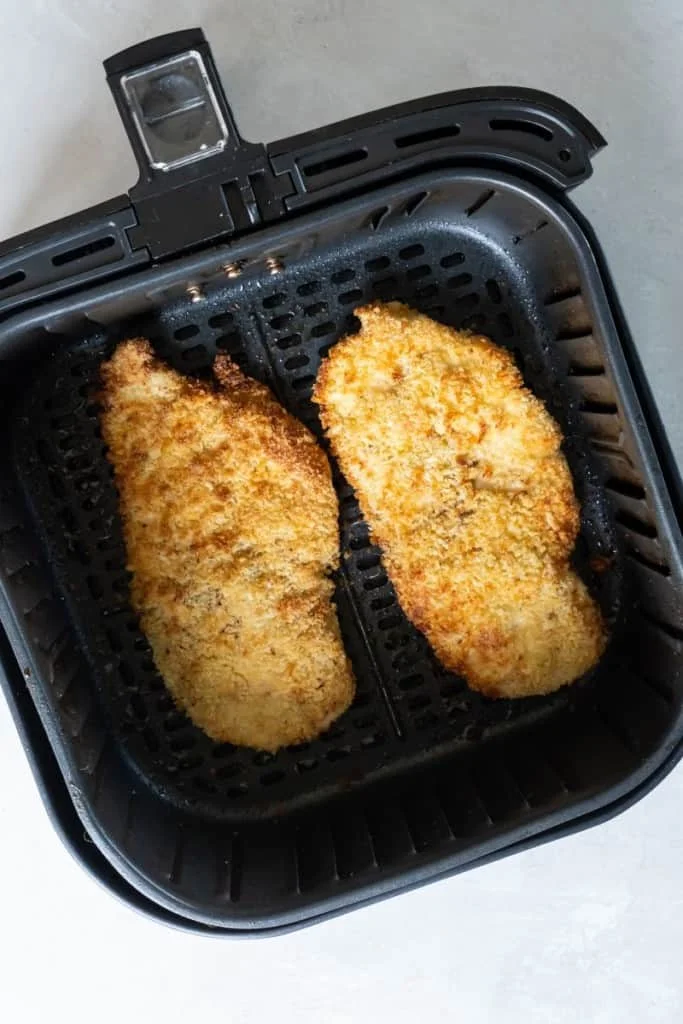 cooked chicken katsu in air fryer basket