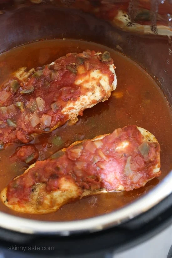Cooked salsa chicken inside the Instant Pot.