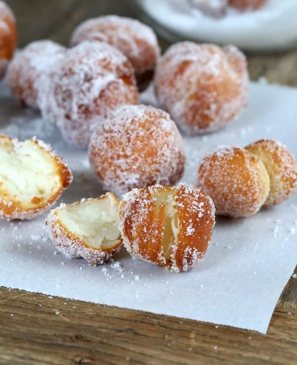 Donut holes on white surface. 