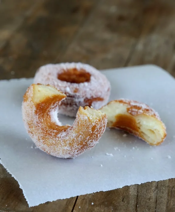 Donuts on white surface.