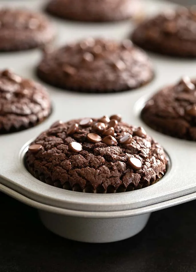 Flourless peanut butter chocolate muffins baked in tray