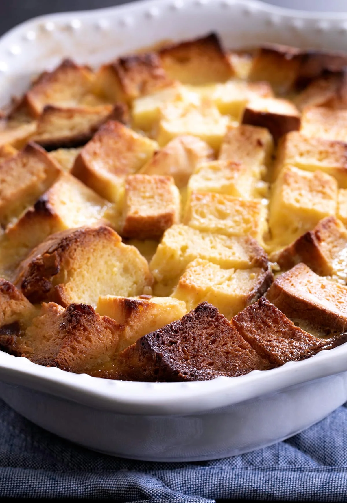 Gluten free bread pudding baked in casserole dish.