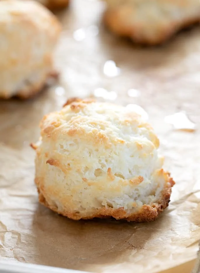 Gluten free drop biscuits baked on tray closeup
