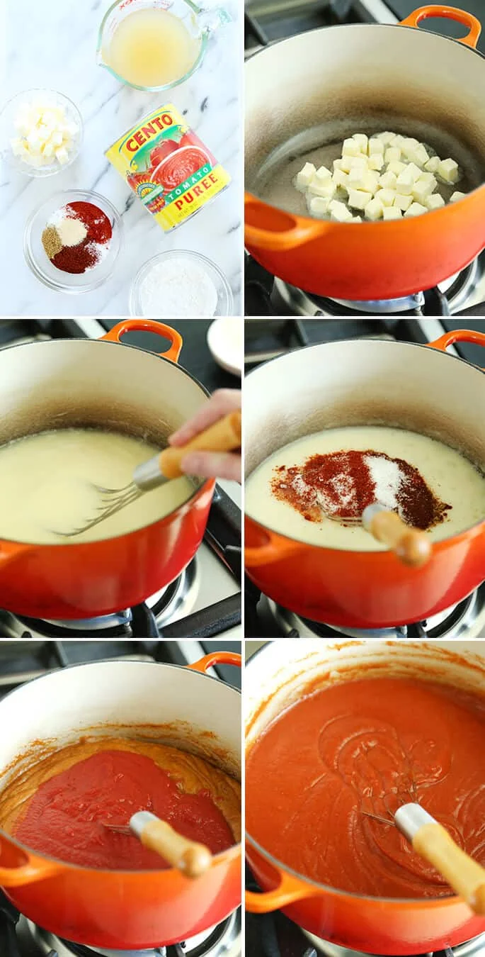 Gluten free enchilada sauce being made in an orange Dutch oven with a whisk