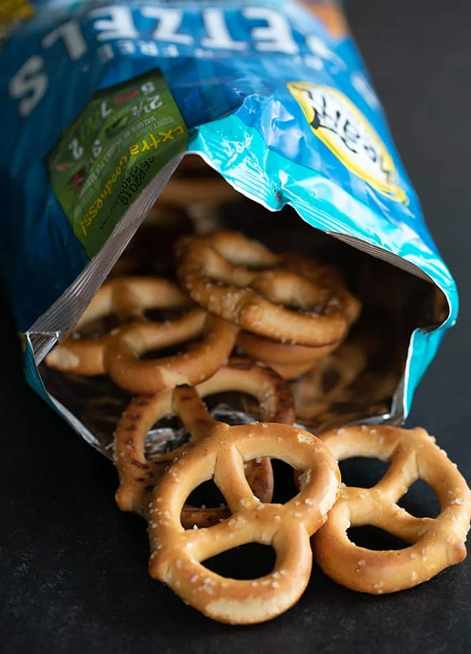 Good Health Enjoy Being Good brand gluten free pretzels are extra crispy and have a great whole grain taste. They only seem to be available in a larger twist size. 