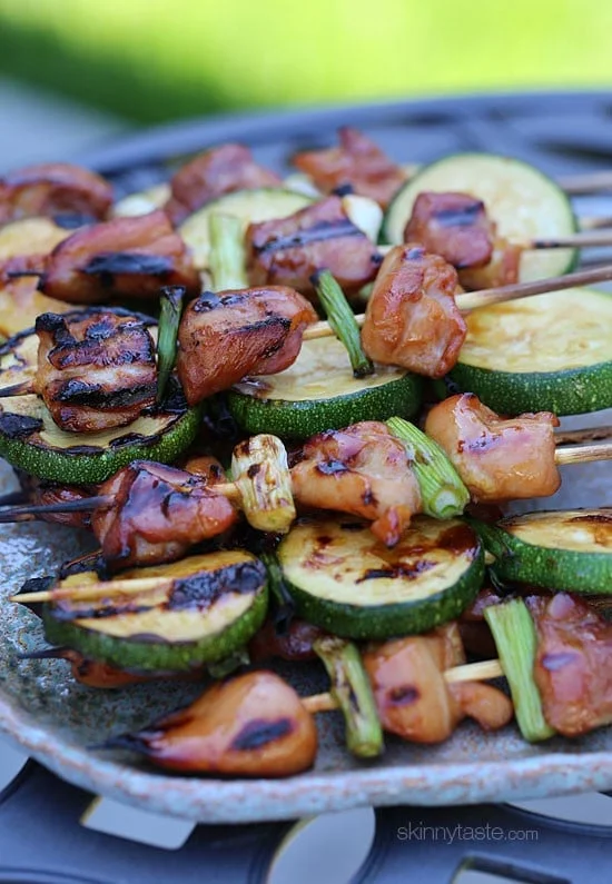 Grilled Chicken and Zucchini Yakitori – Japanese inspired grilled chicken and zucchini skewers marinated with yakitori sauce and threaded onto bamboo sticks with green onions. 