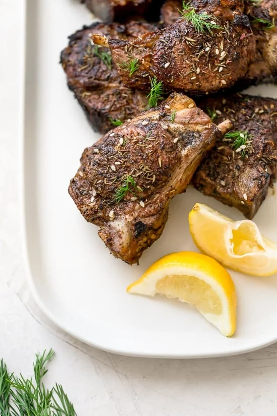 Grilled lamb loin chops seasoned with Za'atar, a Mediterranean blend of sumac, thyme, sesame and salt.