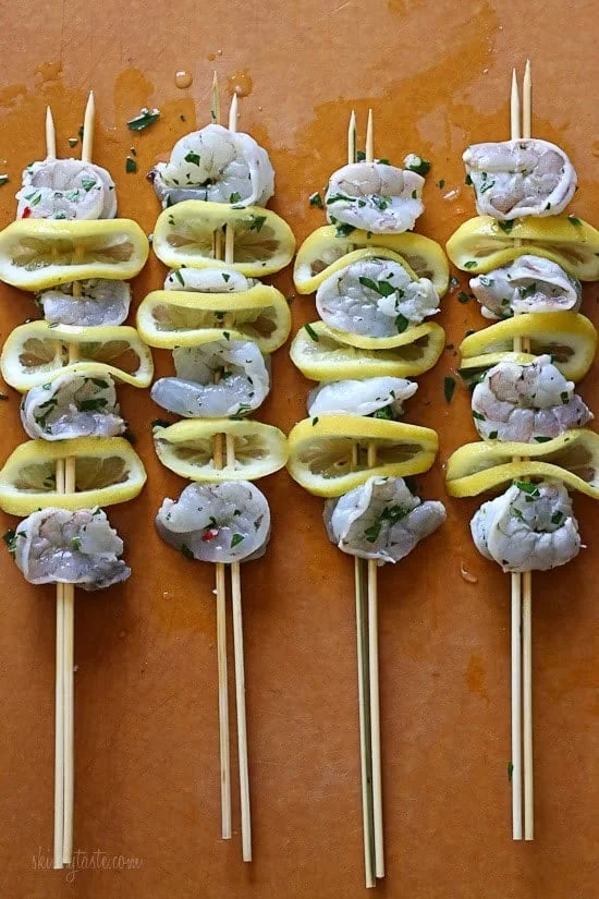 Grilled Shrimp Scampi Skewers – lemon, garlic, parmesan and parsley are the perfect combination for these delicious skewers!
