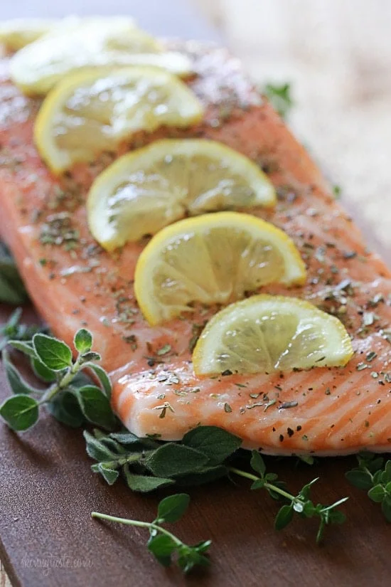 Grilled wild Mediterranean cedar plank salmon topped with tomatoes, kalamata olives and red onion.