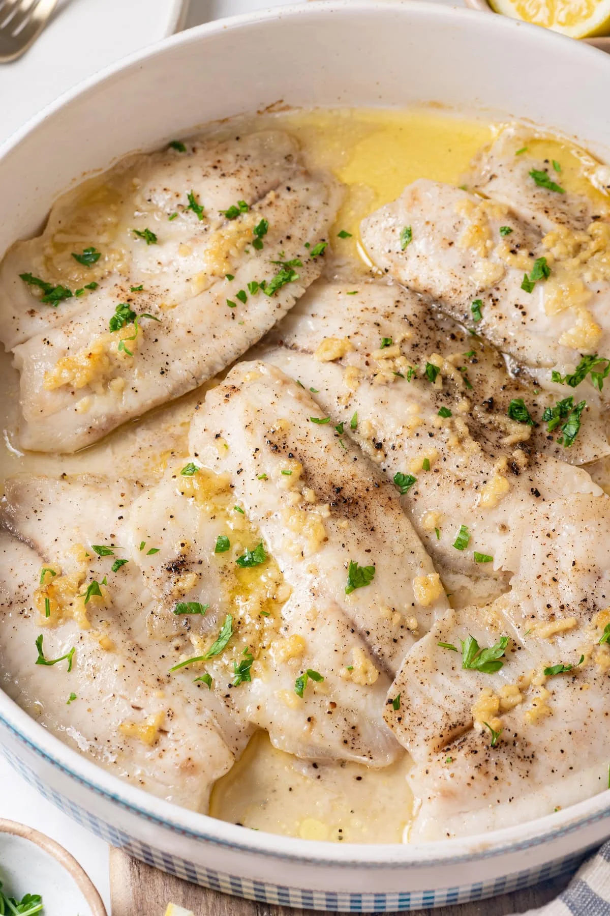 Healthy baked tilapia in pan