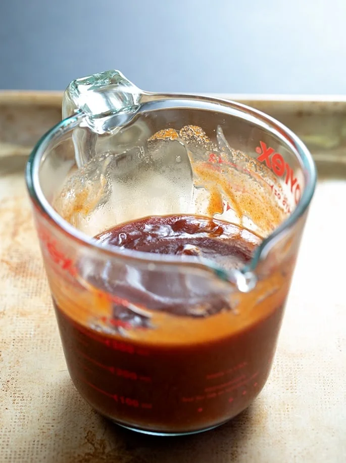 homemade BBQ sauce in a measuring cup