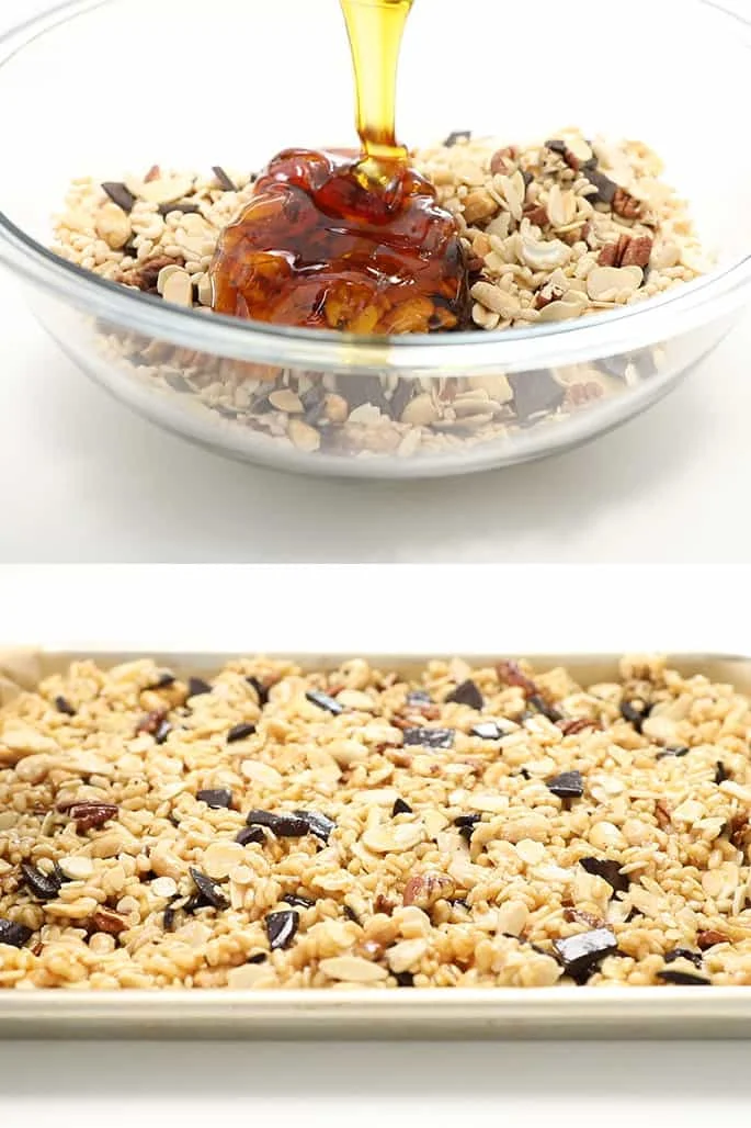 Honey drizzling into large glass mixing bowl and metal baking sheet with light brown cereal and nuts and pieces of chopped chocolate