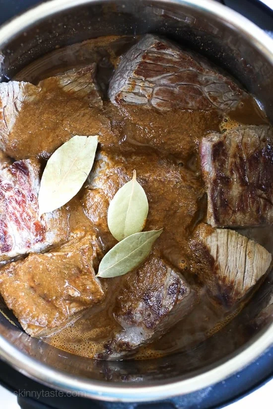 If you like cumin and spicy food, then you'll love Barbacoa Beef. Spicy shredded beef braised in a blend of chipotle adobo, cumin, cloves, garlic and oregano.