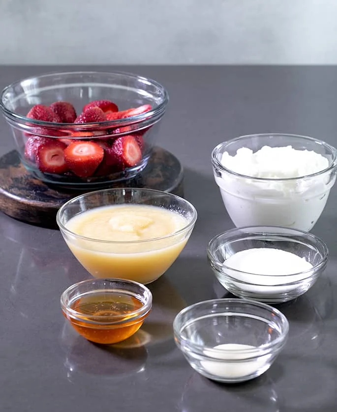 If you've ever wondered how to make frozen yogurt at home (can you just freeze Greek yogurt in an ice cream machine?) this recipe is for you!