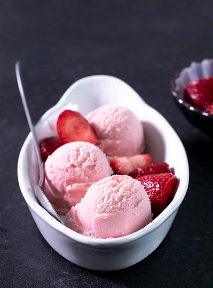 If you've ever wondered how to make frozen yogurt at home (can you just freeze Greek yogurt in an ice cream machine?) this recipe is for you!