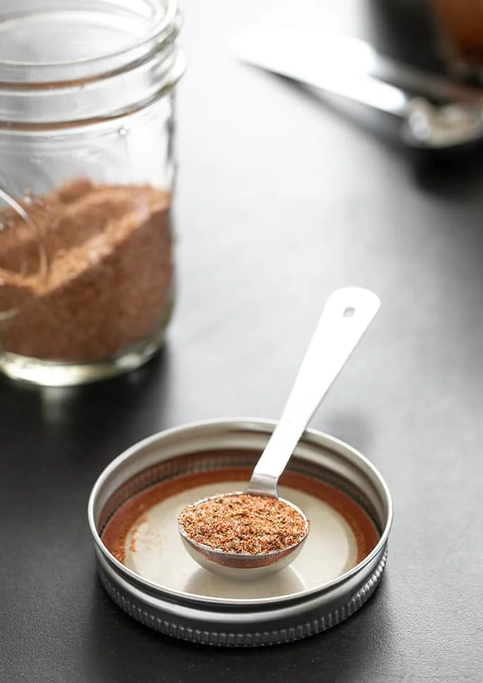 Image of a teaspoonful of gluten free taco seasoning.