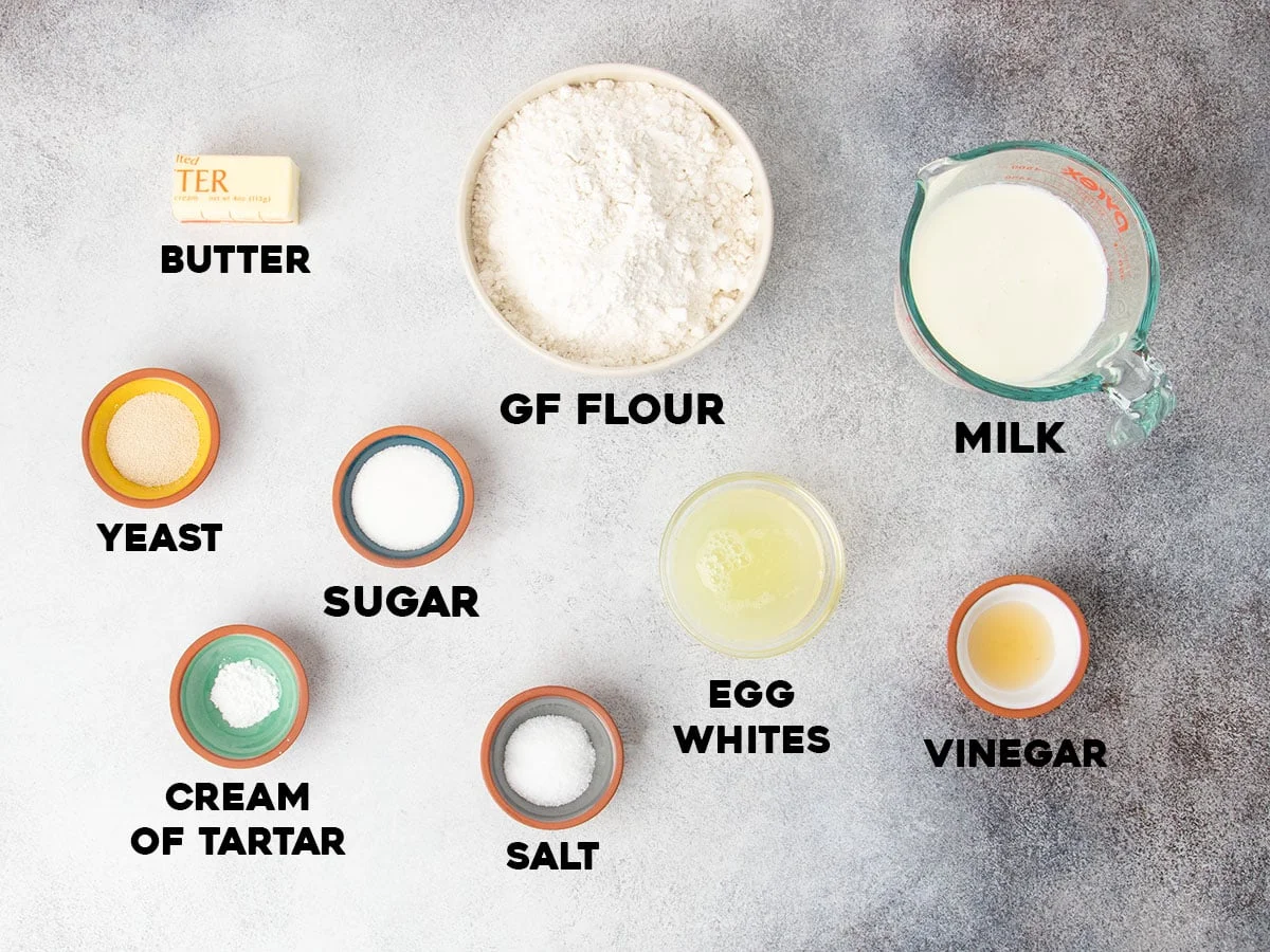 Ingredients needed for the bread in small bowls.