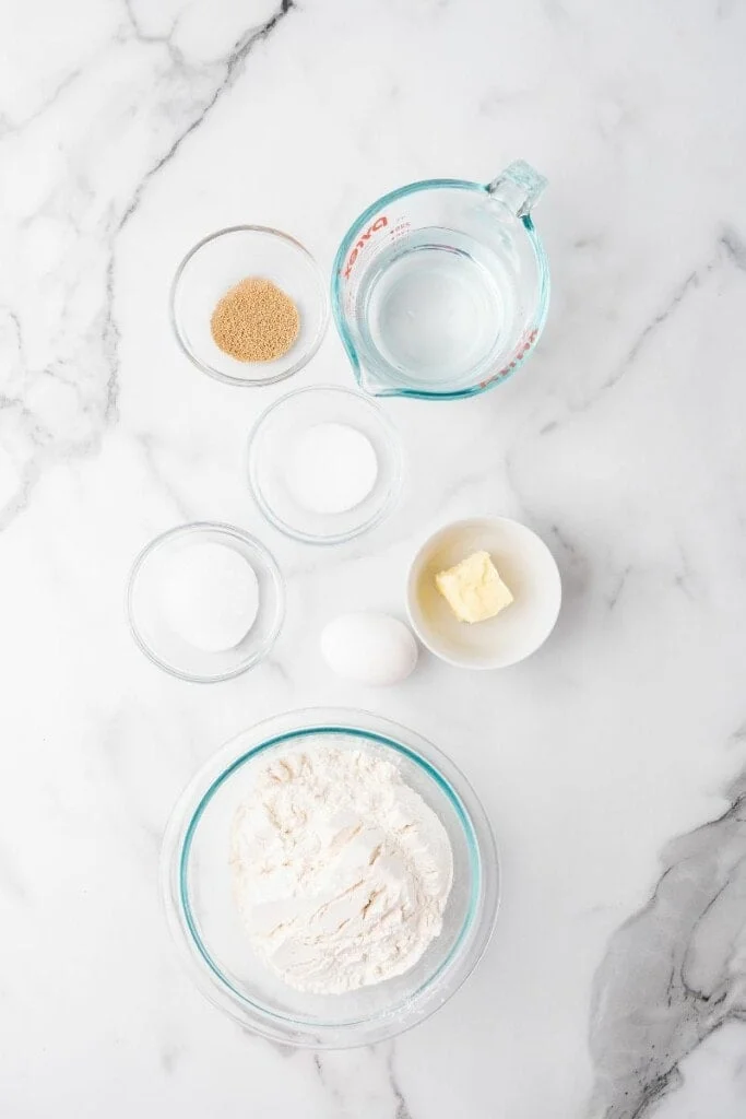 Ingredients needed to prepare homemade bread in an air fryer.