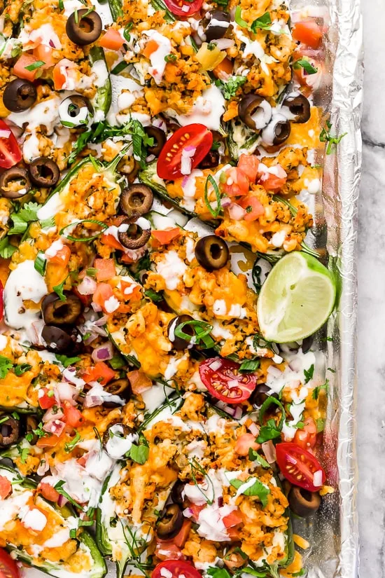 Jalapeno Poppers meet nachos in this fun, low-carb twist of two classic appetizers, perfect for sharing!