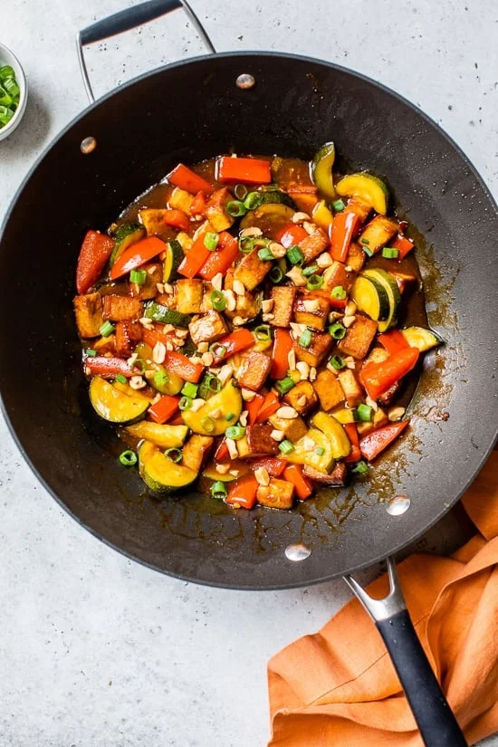 Kung Pao Tofu in a large wok.