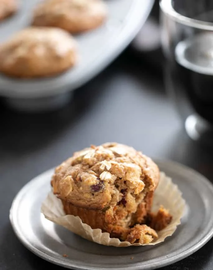 Lightly sweet gluten free morning glory muffins are packed with carrots, apples, coconut, and dried fruit. A super satisfying, healthy breakfast.