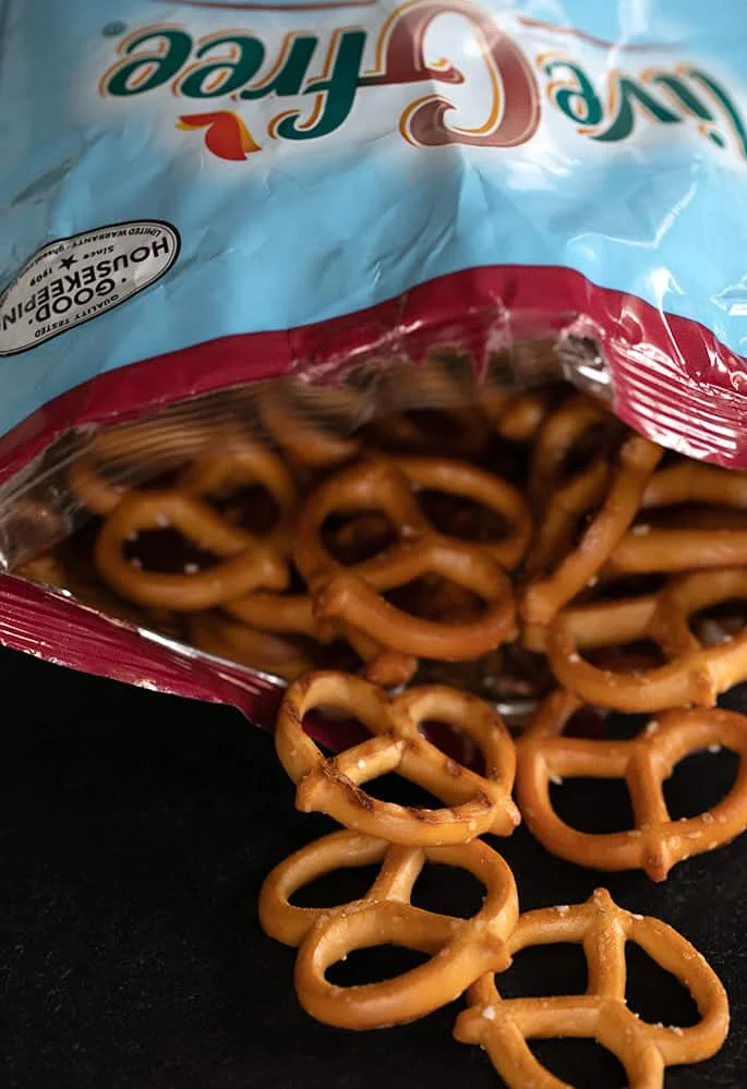 Live G Free brand gluten free pretzels are the house brand from Aldi stores, so you can't beat the price. They are on the sweeter side, but the texture is perfect. 